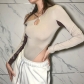 New women's fashion oblique shoulder sleeves hollow contrast color stitching slim long-sleeved T-shirt women K21K07932