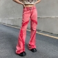 Low-rise denim flared trousers with metal waist buttons NW23446