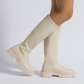 Small white boots with thick soles and high shafts are thinner than knees PL0413