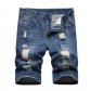 Perforated men's denim pants with many tattered jeans KS003